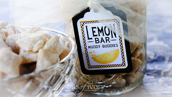 Close up of muddy buddies in a crystal bowl and canning jar with a tag