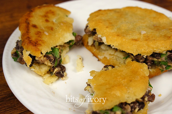 Arepas with black bean filling